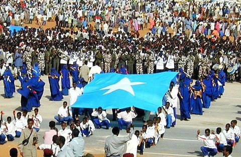 Crowds celebrating Somali Independence Day in Mogadishu with Somali flags